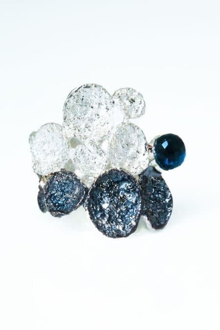 Rhodium plated textured silver ring with blue crystal gallery 2