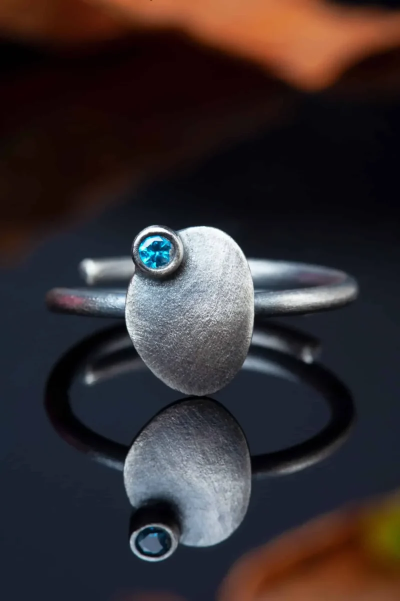 Handmade Jewellery | Oval silver ring with blue zircon gallery 1