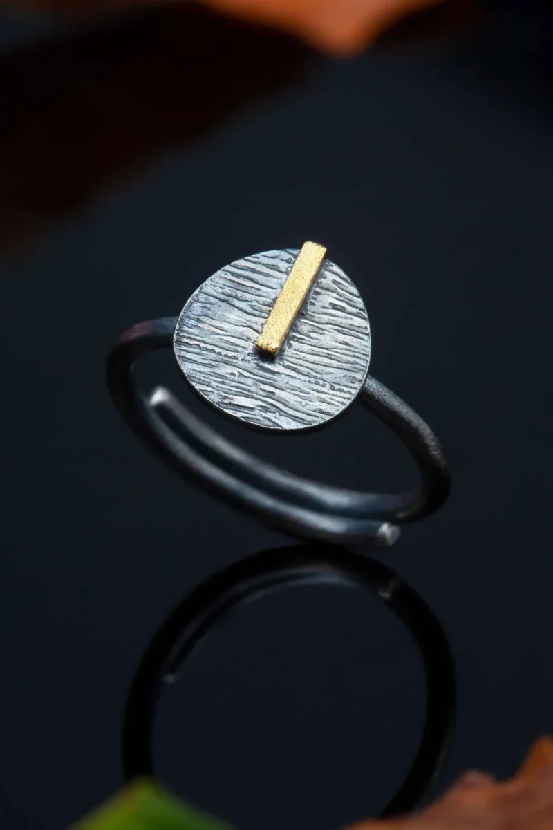 Handmade Jewellery | Round silver textured black ring gallery 1