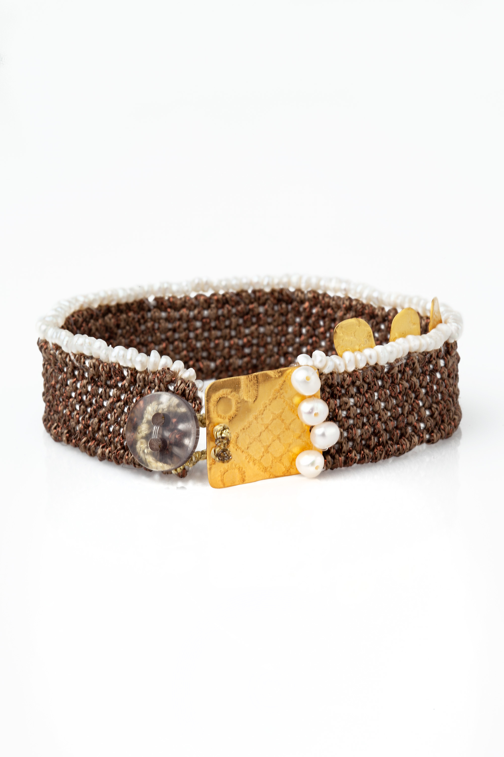 Woven bracelet with gold plated silver and pearls main