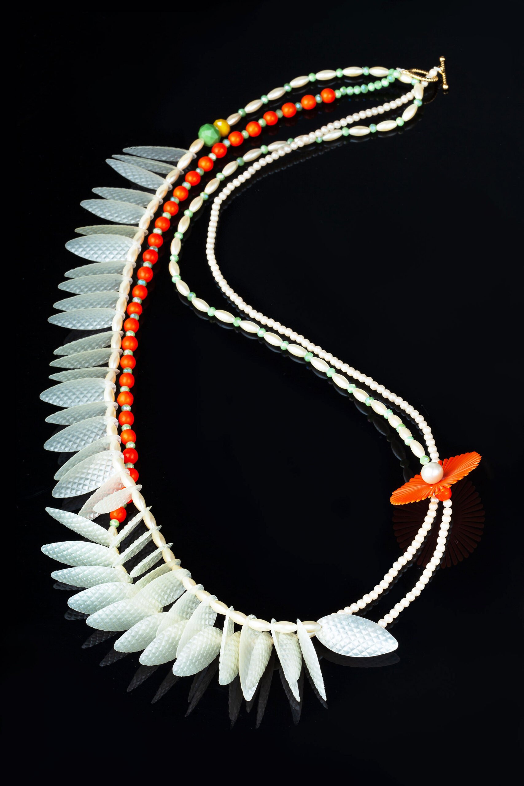 Colourful long necklace with variety of elements main